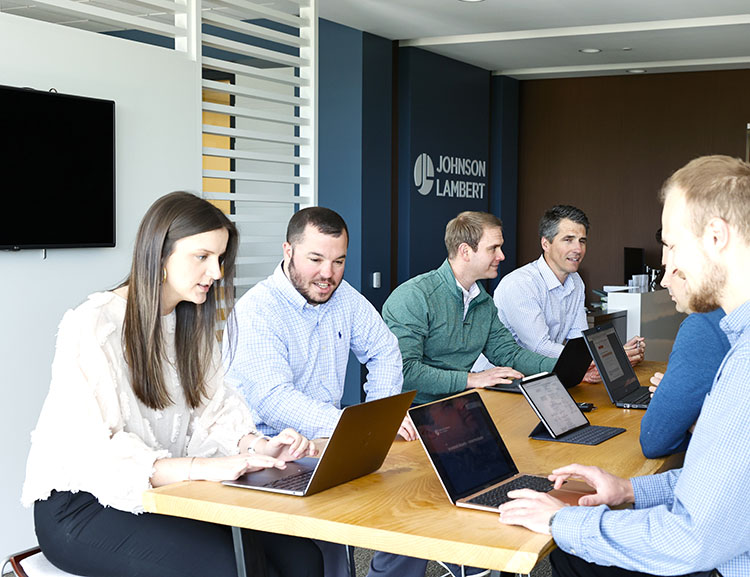 Services - Audit - Careers Image - NC Office - SH Skeptical in Group Meeting - April 2021